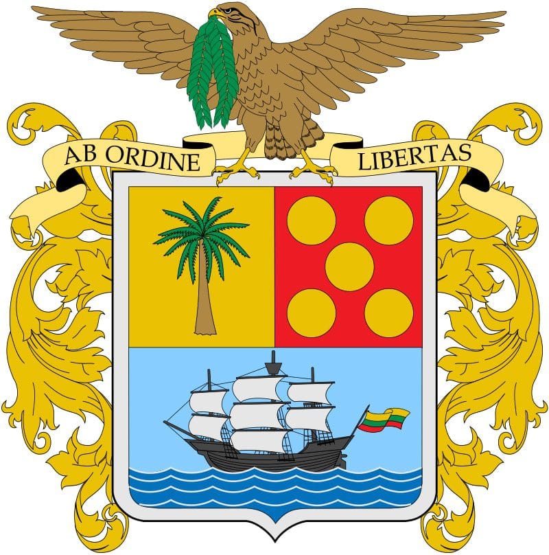 El escudo de Bolívar, Colombia, es un símbolo heráldico que representa la historia y los valores de este departamento. El escudo está coronado por un águila real de color marrón con las alas extendidas, sosteniendo en su pico un follaje verde. Debajo del águila, se despliega una banda dorada con la inscripción "AB ORDINE LIBERTAS" en letras negras, que significa "Libertad a través del orden". El cuerpo principal del escudo está dividido en tres secciones. La sección superior izquierda es de color amarillo y presenta una palmera alta y frondosa. La sección superior derecha es de color rojo y contiene cinco círculos amarillos dispuestos en un patrón de 2-1-2. La sección inferior es de color azul claro y muestra un barco de tres mástiles con velas blancas y velas a medias desplegadas, navegando sobre olas azules. En la popa del barco ondea una bandera tricolor en verde, amarillo y rojo, con los colores dispuestos horizontalmente. El escudo está flanqueado a ambos lados por elaborados adornos dorados de estilo barroco, con volutas y hojas entrelazadas, que añaden un aire de grandeza y tradición a la composición. El fondo general de la imagen es blanco, lo que resalta los detalles del escudo. El estilo de la ilustración es claro y estilizado, con contornos definidos y colores planos, característico de los emblemas heráldicos. La atmósfera general es solemne y representativa, evocando un sentido de identidad y legado.